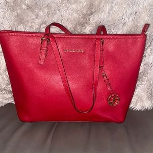 Michael Kors purse 19x10 Red purse slightly used